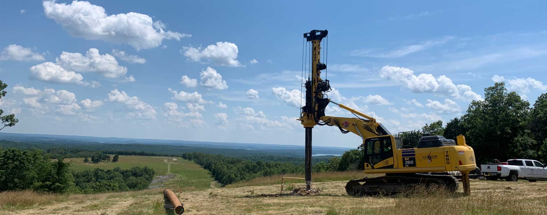 Drilling equipment with vast sky and landscape